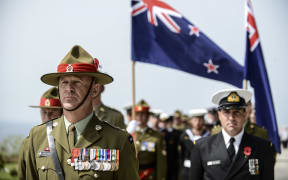 Australian and New Zealand soldiers take stand during the ceremony celebrating the 99th anniversary of the Anzac Day in Turkey on April 24, 2014.