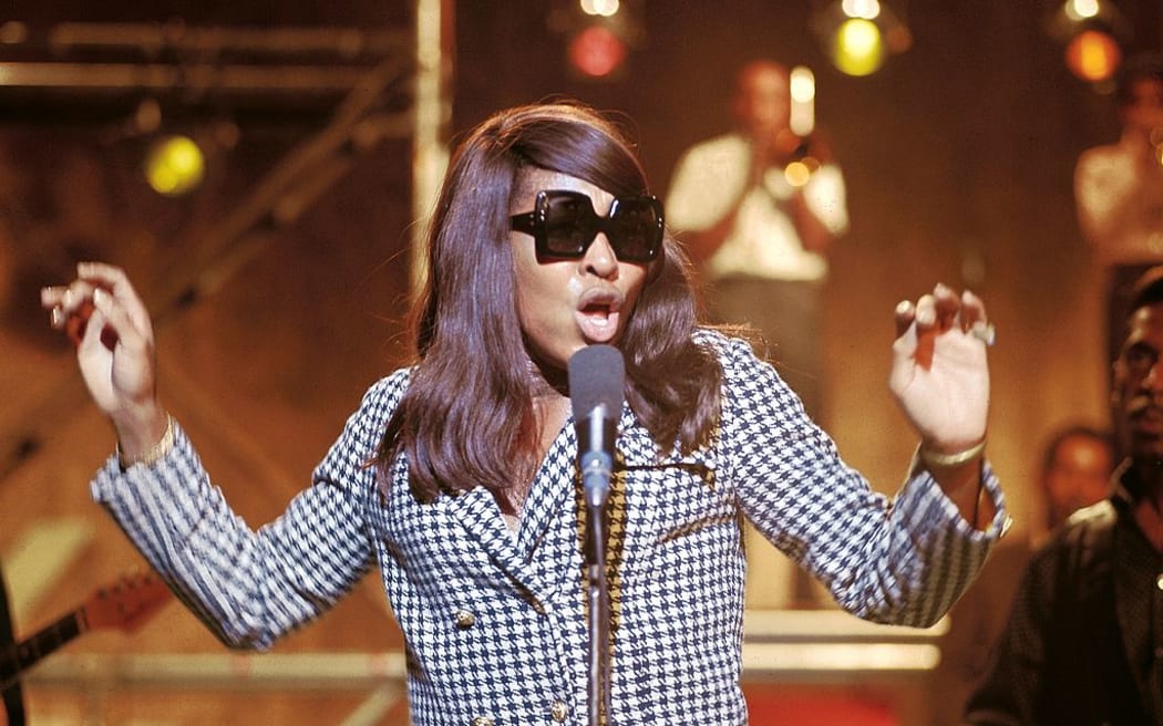 American singer Tina Turner of The Ike & Tina Turner Revue wears sunglasses and performs on stage during the taping of Associated Rediffusion Television's pop music television show Ready Steady Go! The show was aired on September 30, 1966 on She's ITV.