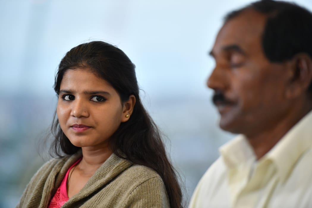 Ashiq Mesih (R) and Eisham Ashiq, the husband and daughter of Asia Bibi, speak during an interview with AFP in London on October 12, 2018.