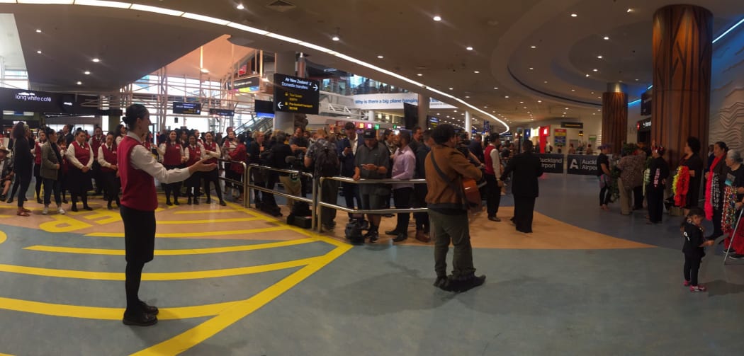 The crowd waits for the Black Ferns to arrive at Auckland Airport.