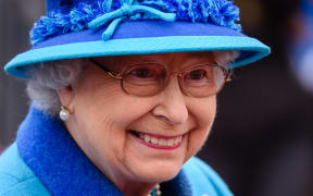 Queen Elizabeth II at a ceremony to officially open a railway on the day she becomes Britain's longest-serving monarch.