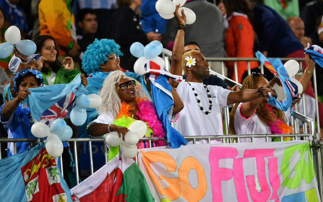 Fiji fans celebrate their teams gold medal win for the men's sevens at Rio olympics.