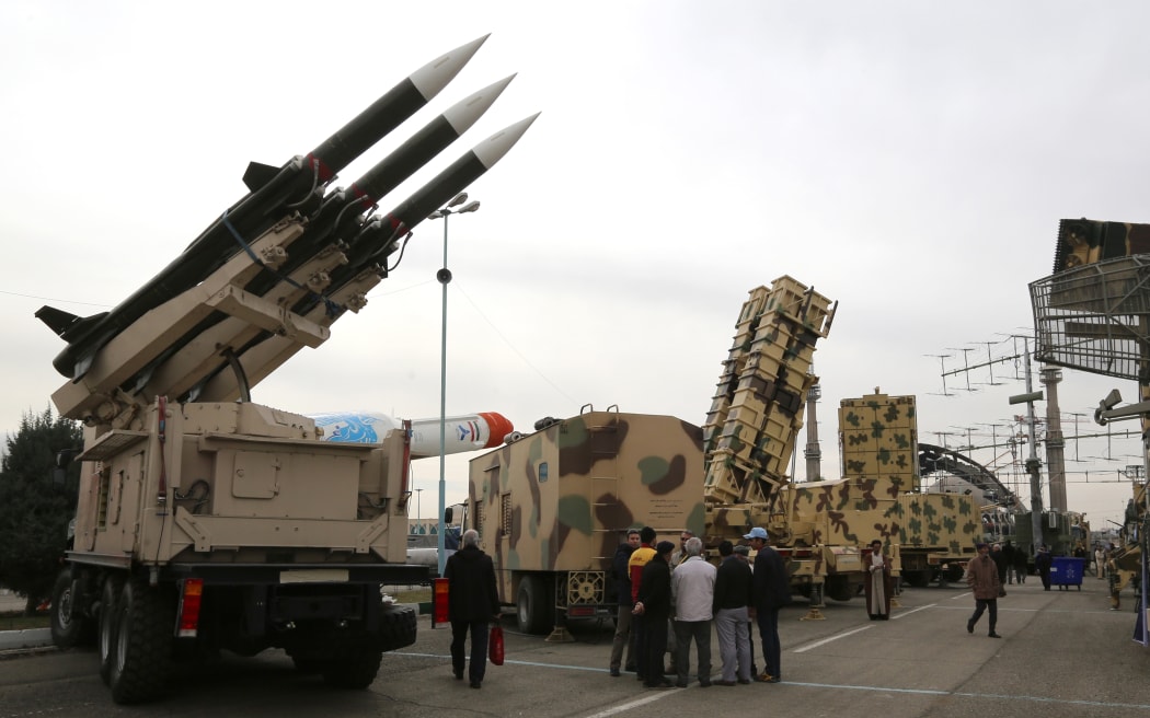 Iranians visit a weaponry and military equipment exhibition in the capital Tehran in February, organised to mark the 40th anniversary of the Iranian revolution.