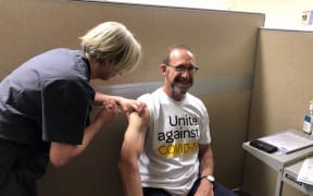Health Minister Andrew Little receives a Covid-19 vaccine, Wellington, 7 April 2021.