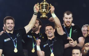 Richie McCaw and Dan Carter with the Webb Ellis Cup after winning the Rugby World Cup Final, London, England. Saturday 31 October 2015.