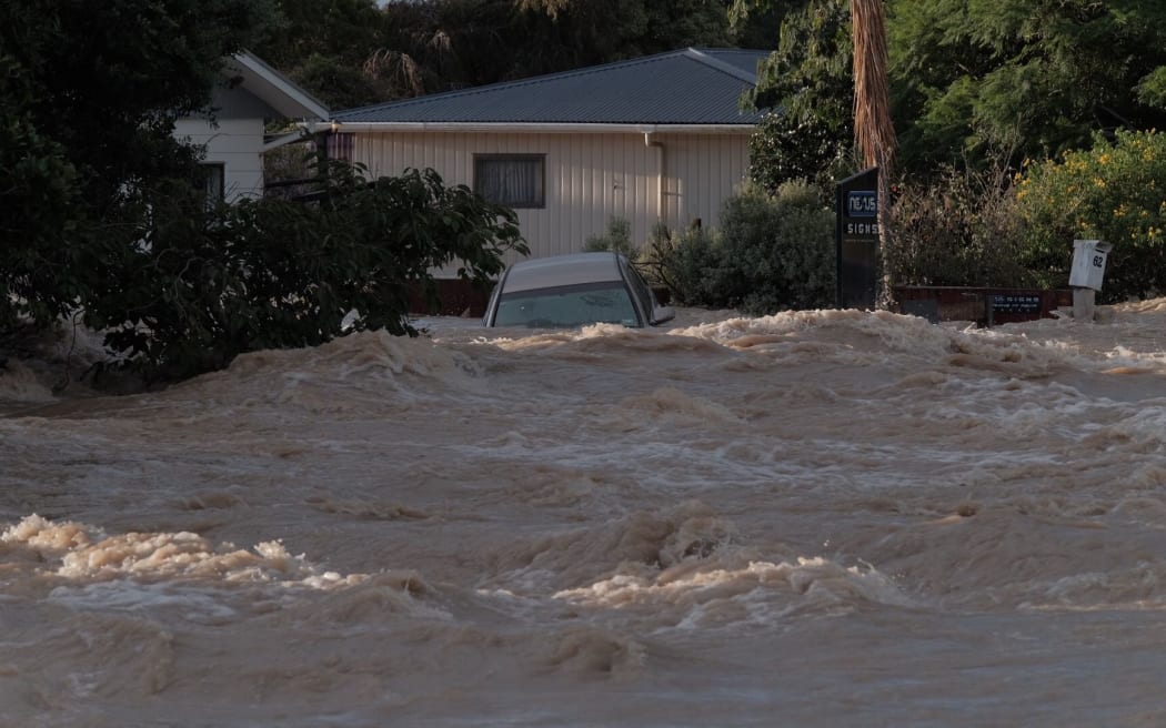 Floodwaters have surged through the Bay of Plenty town of Edgecumbe with almost the entire town of 1600 residents evacuated.