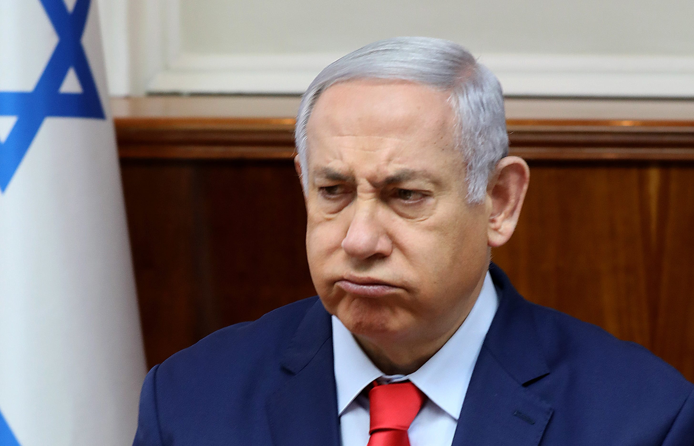 Israeli Prime Minister Benjamin Netanyahu reacts at the start of the weekly cabinet meeting at his Jerusalem office on May 12, 2019. (Photo by GALI TIBBON / POOL / AFP)