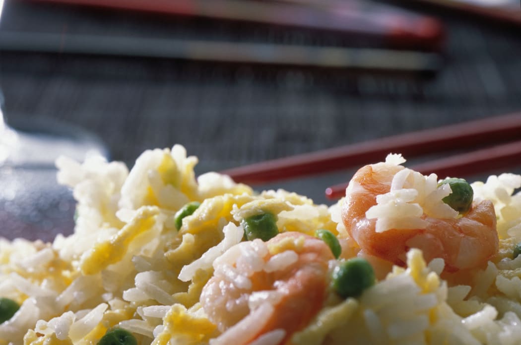 Close-up of fried rice with shrimps. (Photo by Brisbois / Wikholm / Photononstop / Photononstop via AFP)