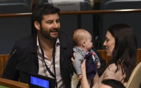 Prime MInister Jacinda Ardern with  daughter Neve and partner Clarke Gayford during the Nelson Mandela Peace Summit at the UN in New York.
