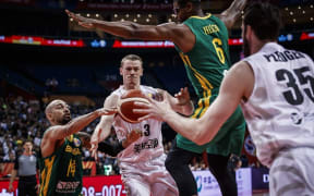 Tall Blacks forward Finn Delany passes the ball to center Alex Pledger during the side's 102-94 loss to Brazil at the Basketball World Cup in China.
