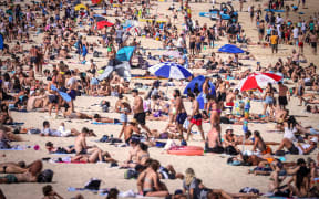 People visit Bondi Beach in Sydney.