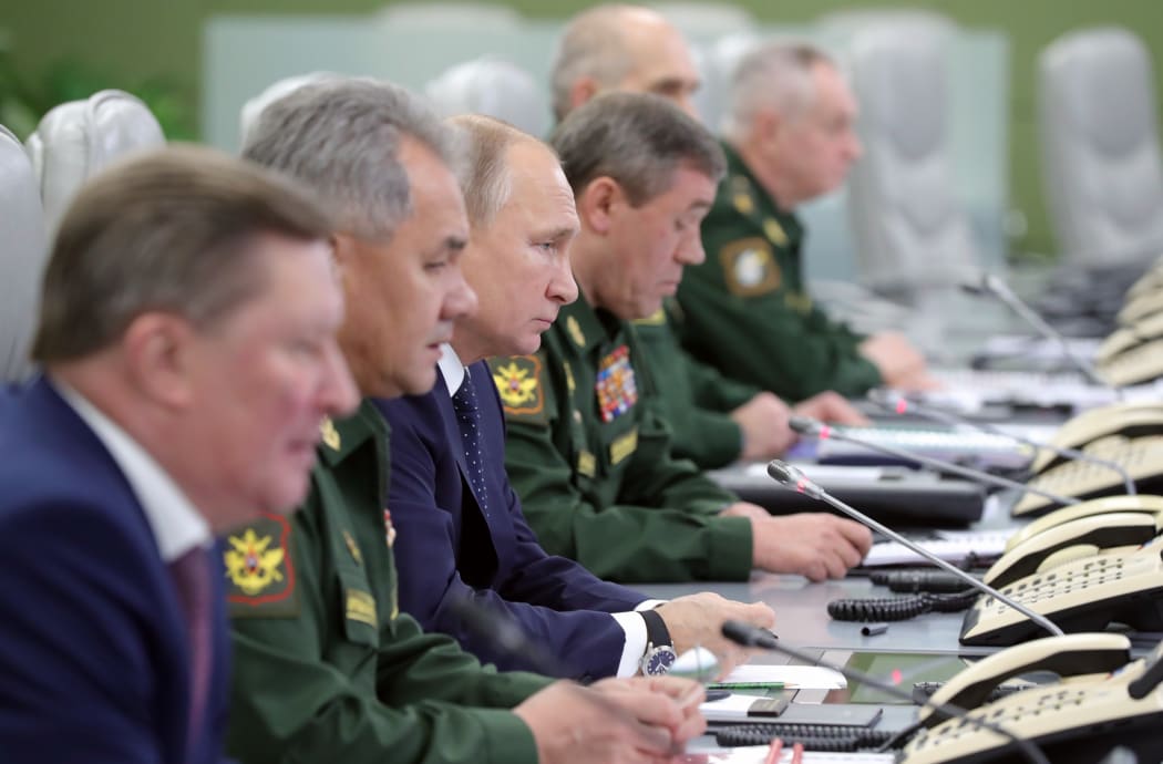 President Vladimir Putin at the National Defense Control Center.