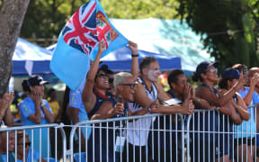 Team Fiji cheer on their paddlers as they tried to chase down Tahiti in the Women's Open V6 final. The race finished with Tahiti winning gold, Fiji silver and Cook Islands bronze. DC Park, Guadalcanal, 29 November 2023.