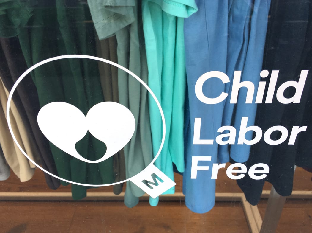 AUCKLAND - MAR 27 2018:Child labor free mark. Products certified with the mark provides assurance that brands carrying it are ethically committed and ensuring their business is free of child labor