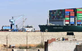 A picture taken on March 29, 2021 shows the Panama-flagged MV 'Ever Given' container ship after being fully dislodged from the banks of the Suez Canal, near Suez city.