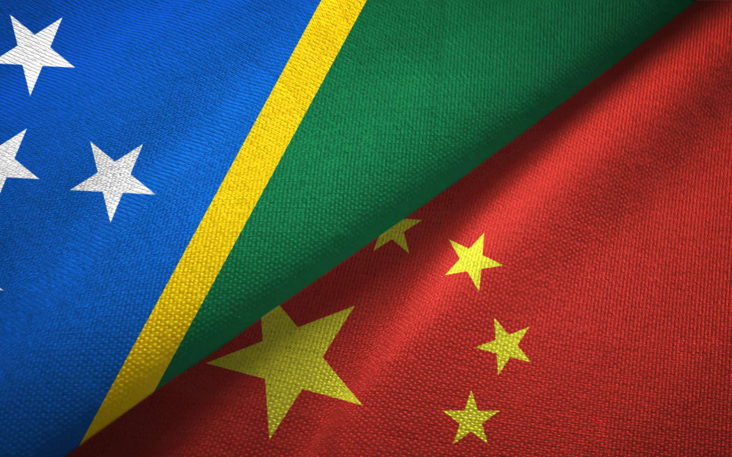 Solomon Islands and China flags together