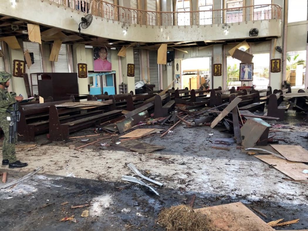 Armed Forces of the Philippines photo taken on January 27, 2019, shows debris inside a Catholic Church where two bombs exploded in Jolo, Sulu province on the southern island of Mindanao.