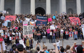 Protesters against US Supreme Court nominee Brett Kavanaugh demonstrate at the US Supreme Court in Washington, DC