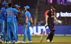 Indian players celebrate the wicket of New Zealand's captain Kane Williamson off the bowling off Mohammad Shami during the ICC Cricket World Cup 2023 Semi-Finals