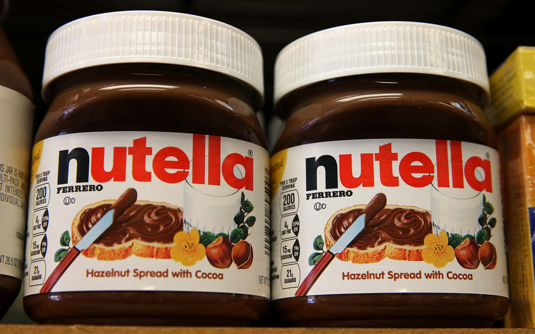 Jars of Nutella are displayed on a shelf at a market in San Francisco.