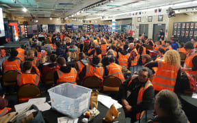 Hundreds of volunteers are given a briefing at Eden Park, one of five hubs for the census of the region's homeless