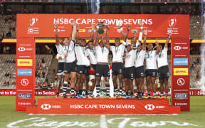 Fiji players celebrate winning the Cape Town Sevens.