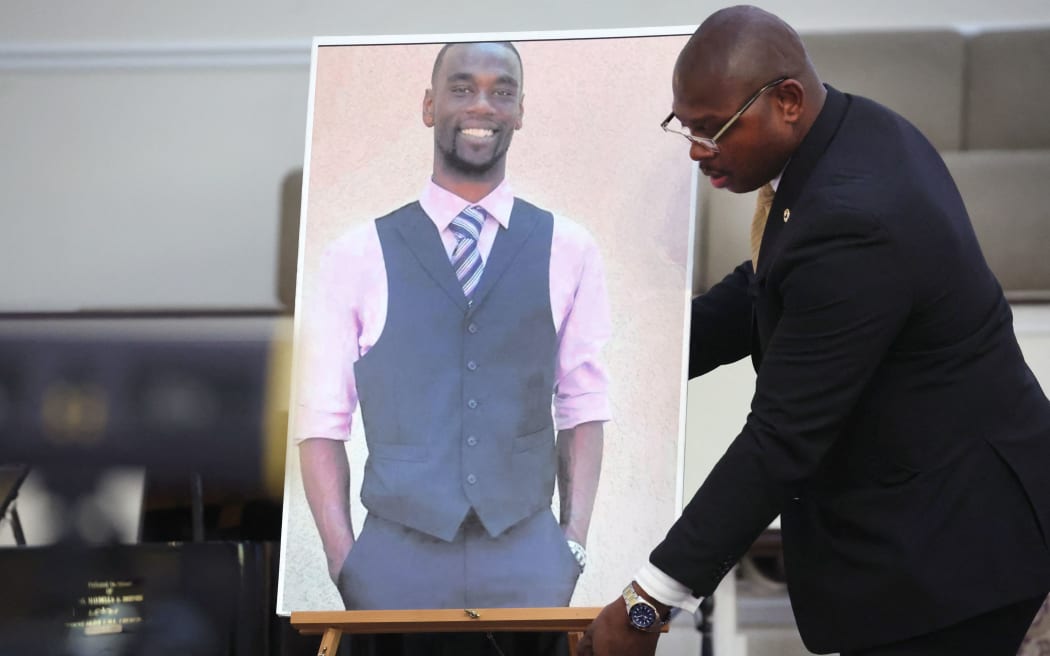 MEMPHIS, TENNESSEE - JANUARY 27: A photo of Tyre Nichols is positioned prior to a press conference on January 27, 2023 in Memphis, Tennessee. Tyre Nichols, a 29-year-old Black man, died three days after being severely beaten by five Memphis Police Department officers during a traffic stop on January 7, 2023. Memphis and cities across the country are bracing for potential unrest when the city releases video footage from the beating to the public later this evening.   Scott Olson/Getty Images/AFP (Photo by SCOTT OLSON / GETTY IMAGES NORTH AMERICA / Getty Images via AFP)