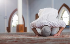 Muslim man praying at mosque (generic).