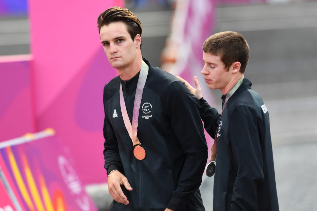 New Zealand's Samuel Gaze with the gold medal and Anton Cooper with the silver at the medal ceremony. Cycling - Mountain Biking. Nerang Mountain Bike Trails. Commonwealth Games, Gold Coast, Australia. Thursday 12 April 2018. © Copyright photo: Andrew Cornaga / www.photosport.nz