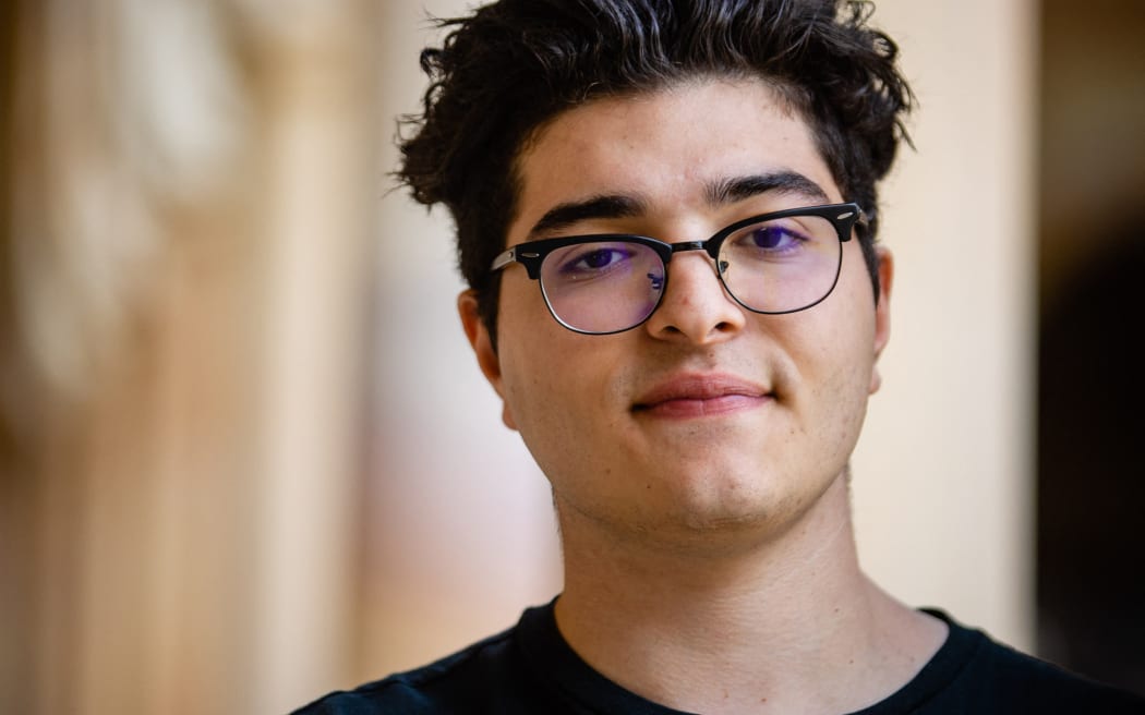 This photo taken on September 1, 2020 shows student Drew Pavlou posing for a photo on the campus of the University of Queensland in Brisbane. - When a Chinese foreign ministry spokesman personally denounced Pavlou at a recent press conference, it was just the next phase in an extraordinary campaign against the 21-year-old that has fuelled concerns over China's targeting of critics overseas. (Photo by Patrick HAMILTON / AFP) / TO GO WITH Australia-China-politics-demonstration-students,FOCUS by Holly ROBERTSON