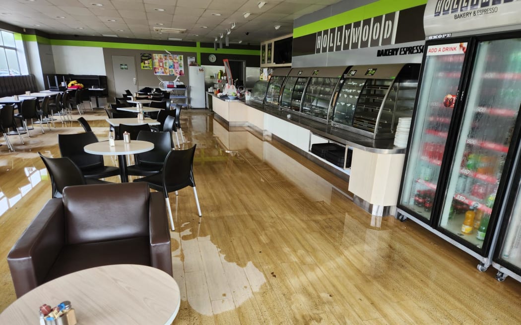 The Hollywood bakery in Wairau on the North Shore has water come through the doors after a severe thunderstorm in Auckland.