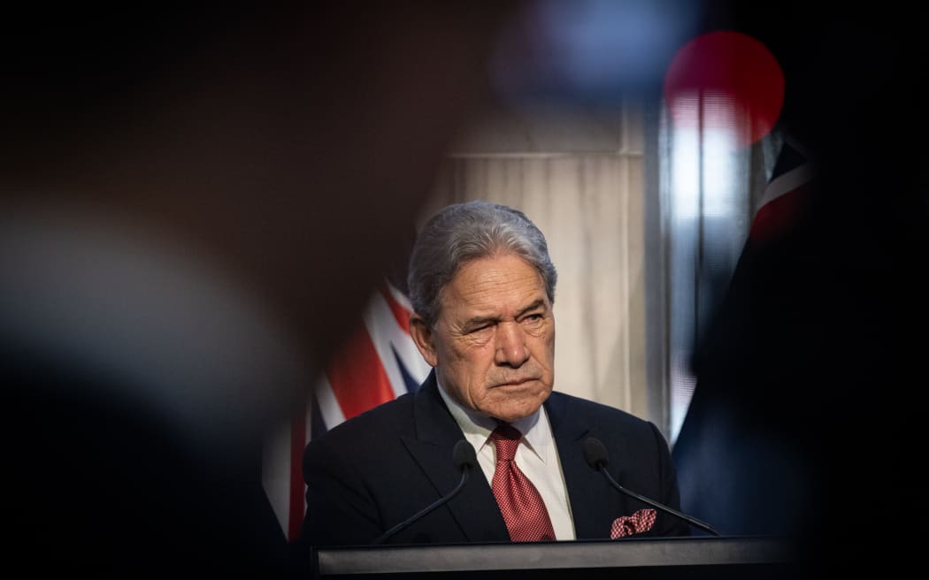 Coalition agreement signing ceremony between Christopher Luxon, David Seymour and Winston Peters.