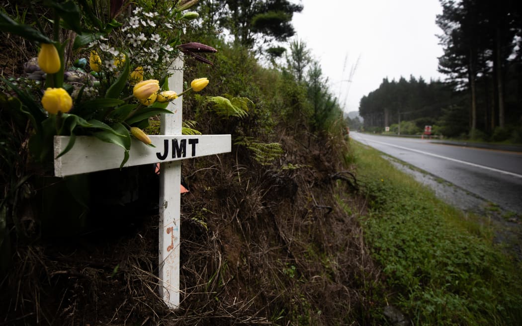 A memorial to Jerrim Toms on the Twin Coast Highway where the shooting took place.