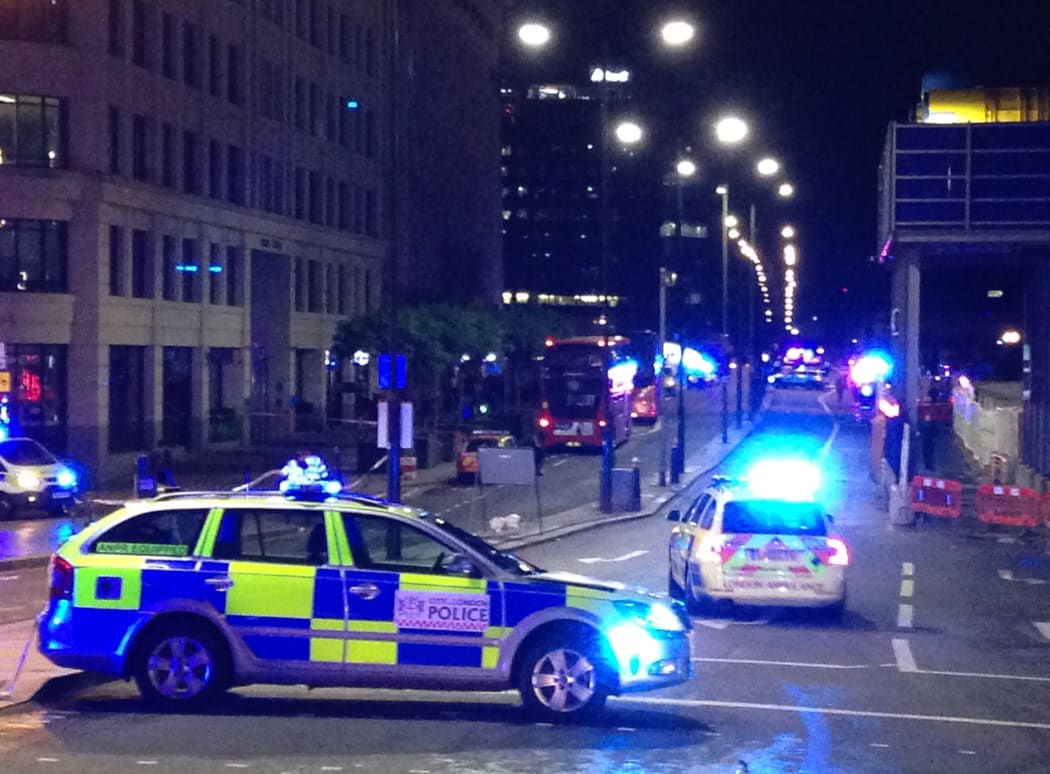 Police respond to the incident at London Bridge.