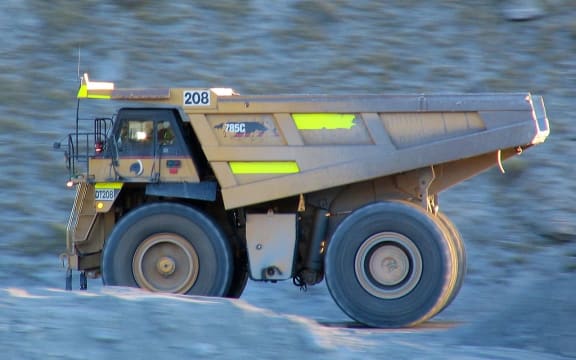 OceanaGold mining truck working the Macraes mine, Otago, New Zealand. Caterpillar 785C
