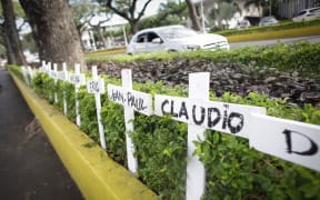 Crosses bearing names of victims set in front of Papeete Court house, on the first day of the trial of Air Moorea company, 11-years after the crash of one of its aircrafts in which 20 people were killed.