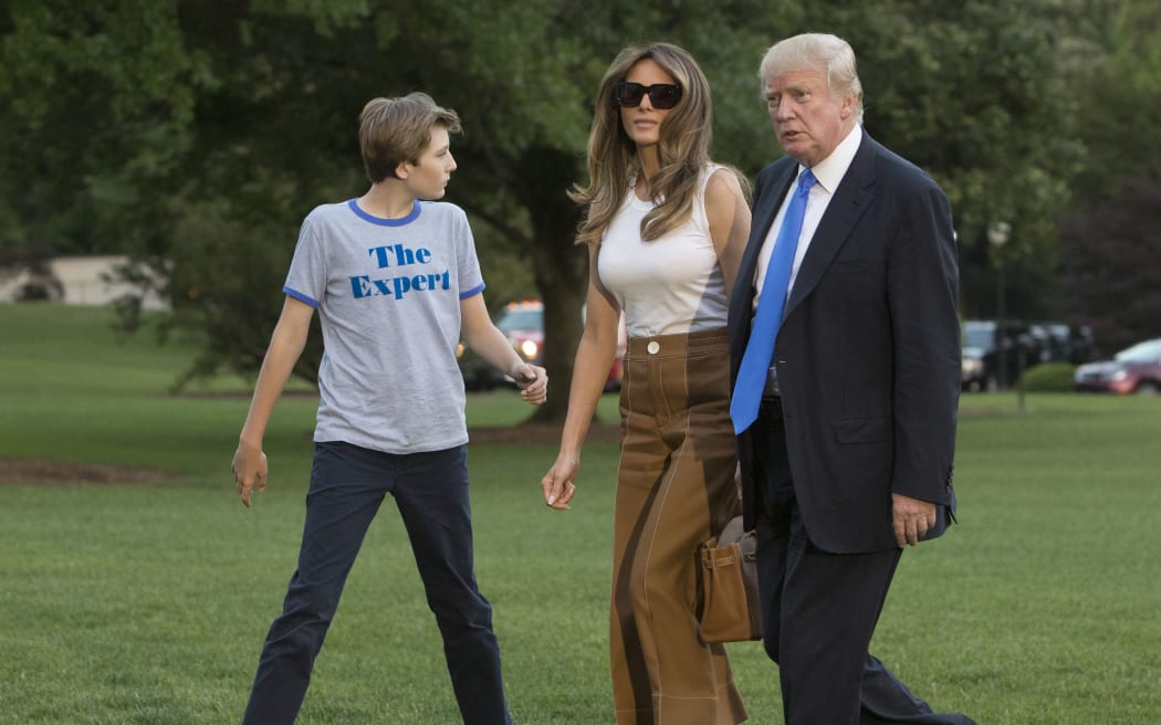 US President Donald J. Trump, First Lady Melania and their son Barron return to the White House after a trip to New Jersey.