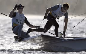 New Zealand's Peter Burling and New Zealand's Blair Tuke compete in the 49er Men sailing class on Guanabara Bay in Rio de Janerio during the Rio 2016 Olympic Games on August 12, 2016.