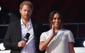 Britain's Prince Harry and Meghan Markle speak during the 2021 Global Citizen Live festival at the Great Lawn, Central Park on September 25, 2021 in New York City.