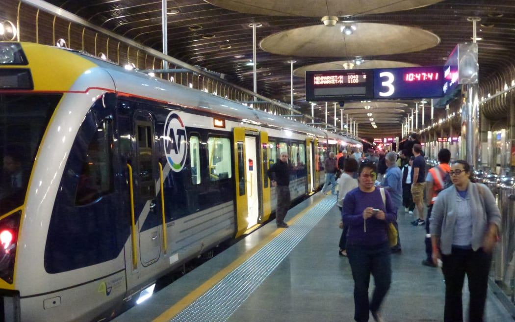 Passengers disembark at Britomart after the first journey on the city's new electric trains.
