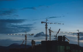 Construction, cranes above buildings, generic.