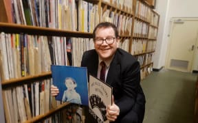 Minister of Finance and Flying Nun fanboy Grant Robertson amongst the RNZ local vinyl archive