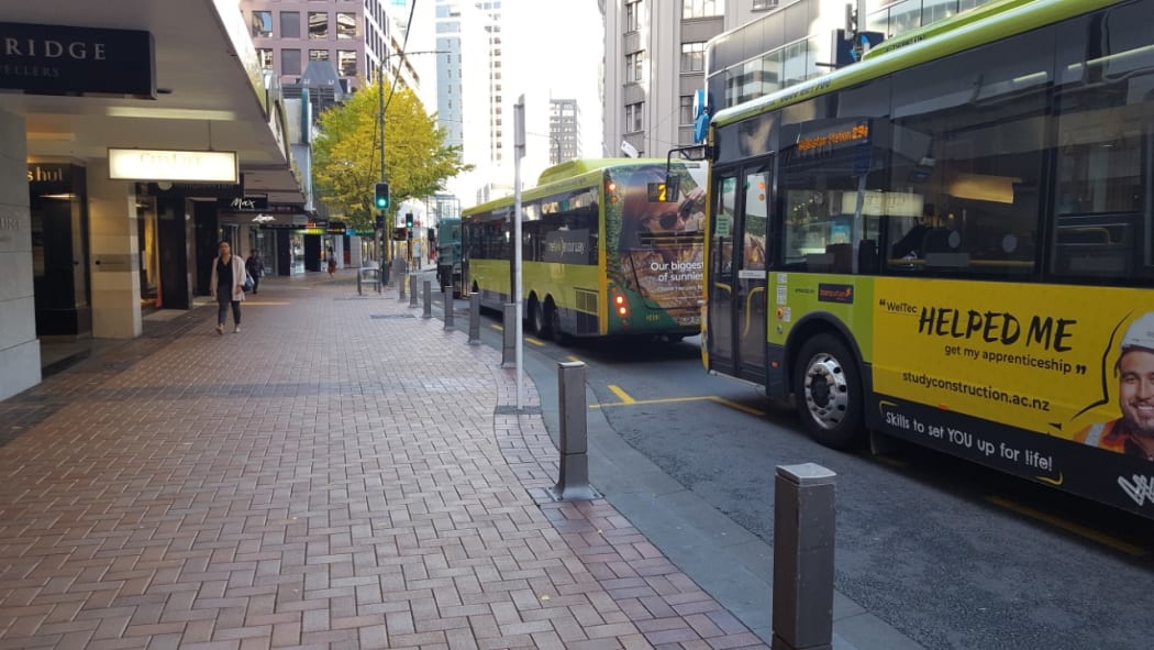 Largely empty buses on Wellington's Lambton Quay on the first day of level 3, 28 April