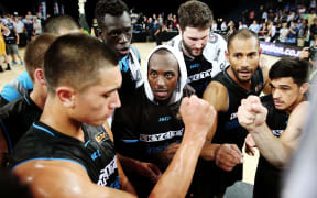 The Breakers huddle during their first semi-final game.