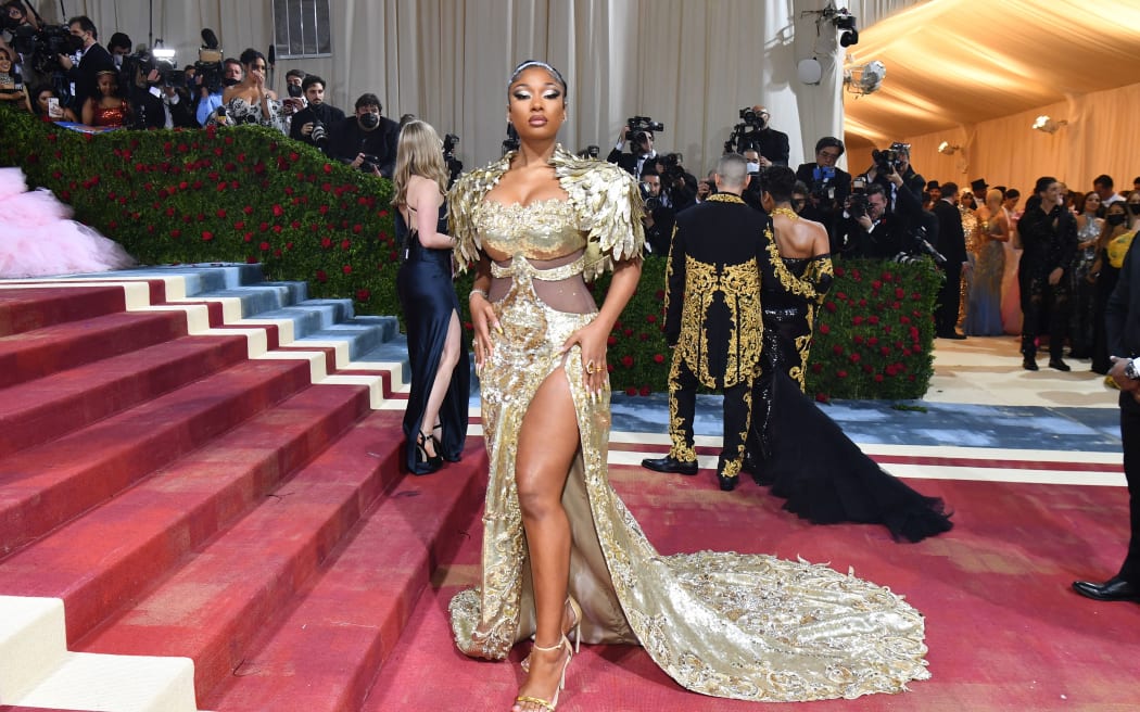 US rapper Megan Thee Stallion arrives for the 2022 Met Gala at the Metropolitan Museum of Art on May 2, 2022, in New York. - The Gala raises money for the Metropolitan Museum of Art's Costume Institute. The Gala's 2022 theme is "In America: An Anthology of Fashion". (Photo by ANGELA  WEISS / AFP) (Photo by ANGELA  WEISS/AFP via Getty Images)