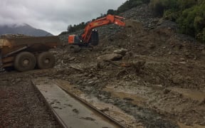 The New Zealand Transport Agency said the most significant slip was just east of Aitkens, where about 20,000 cubic metres of debris was covering the road.