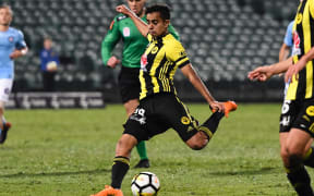 Wellington Phoenix youngster Sarpreet Singh shoots for goal.