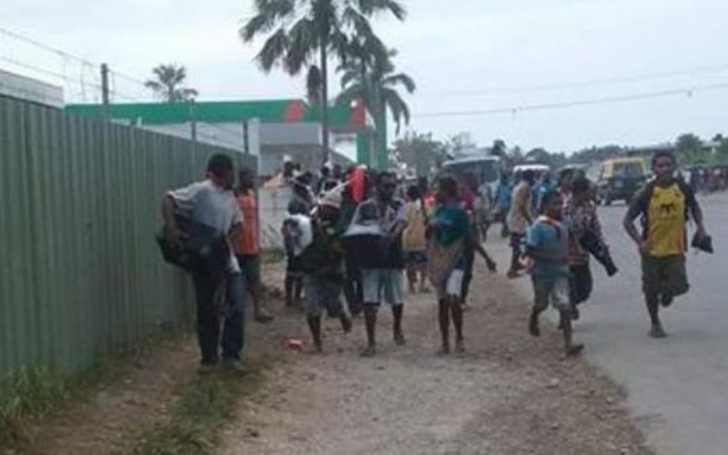 Looters on the loose in Madang town, Papua New Guinea.