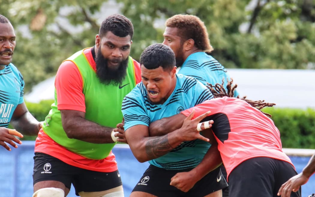 Semi Radradra places the ball on the ground as the team prepared for Wales in Lormont, France this week.