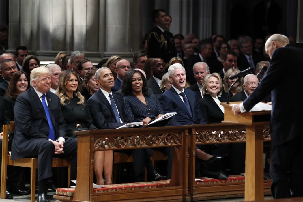 Trump, Melania Trump, Barack Obama, Michelle Obama, Bill Clinton, Hillary Clinton and Jimmy Carter listen as former Sen. Alan Simpson, R-WY., speaks during a State Funeral Funeral former US President George H.W. Bush.